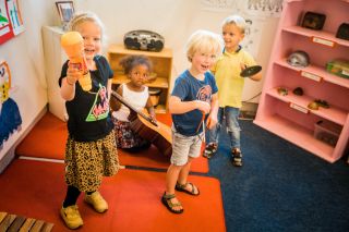 Muziekakkoord Drenthe - Muziek in de kinderopvang - Vrolijke kinderen met instrumenten